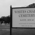 White's Chapel cemetery was established in 1851 when a family heading west buried their dead infant in an unmarked grave there