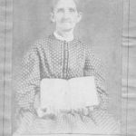 Miranda Grandberry Joyce holds the family Bible. Miranda died in 1870 and her husband, James, died in 1882. Both are buried in Mt. Gilead cemetery in Keller, Texas. Courtesy Joyce family