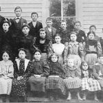 By the 1890s, White's Chapel school had two rooms, one made of logs and the other wood framed. The school had no well from which to draw water, so the teachers and students got water from a water tank west of the church. Courtesy of Shivers family