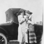Alno (left) and Eunice Bailey grew up in the White's Chapel community. The sisters are pictured here in front of the family automobile in the 1920s. Alno wrote on the back of the photograph, "I made my dress." Courtesy of Shivers family