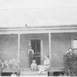 L. N. Bailey family members on their farmhouse porch which was located in the White's Chapel community. Courtesy of Shivers family