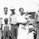 Arthur and Dolah Tate lived "north of Denton Creek before there was a Lake Grapevine," wrote granddaughter Merrill Stacy, seen standing in between her grandparents, circa 1934. Courtesy of Stacy family