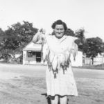 Oma Blevins Douglass near Boards Store, circa 1940s. Courtesy R.E. Smith family