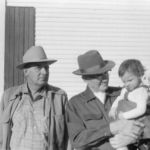 Owen Brumlow (for which Brumlow Avenue is named) standing next to Arthur Ritchey holding Margaret Stowe, circa 1950s. Courtesy of Wanda Stowe