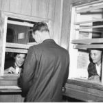In 1964, Lavon Baird became the town's first postmistress. Friend Mollie Cummings is in the window to the left. Mayor Schell, who served from 1964 to 1967, has his back to the camera. SHS archives