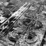 Seventeen thousand acres of prairie were purchased to build the airport. The unique terminal system is taking shape here. Courtesy of DFW Airport