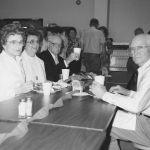 Claude Shivers on the right and Alno Bailey Shivers across from him on the left attending a Carroll School reunion, circa 1980s. Alno and Claude met at the 1919 Carroll School close to 60 years earlier. Courtesy Shivers family
